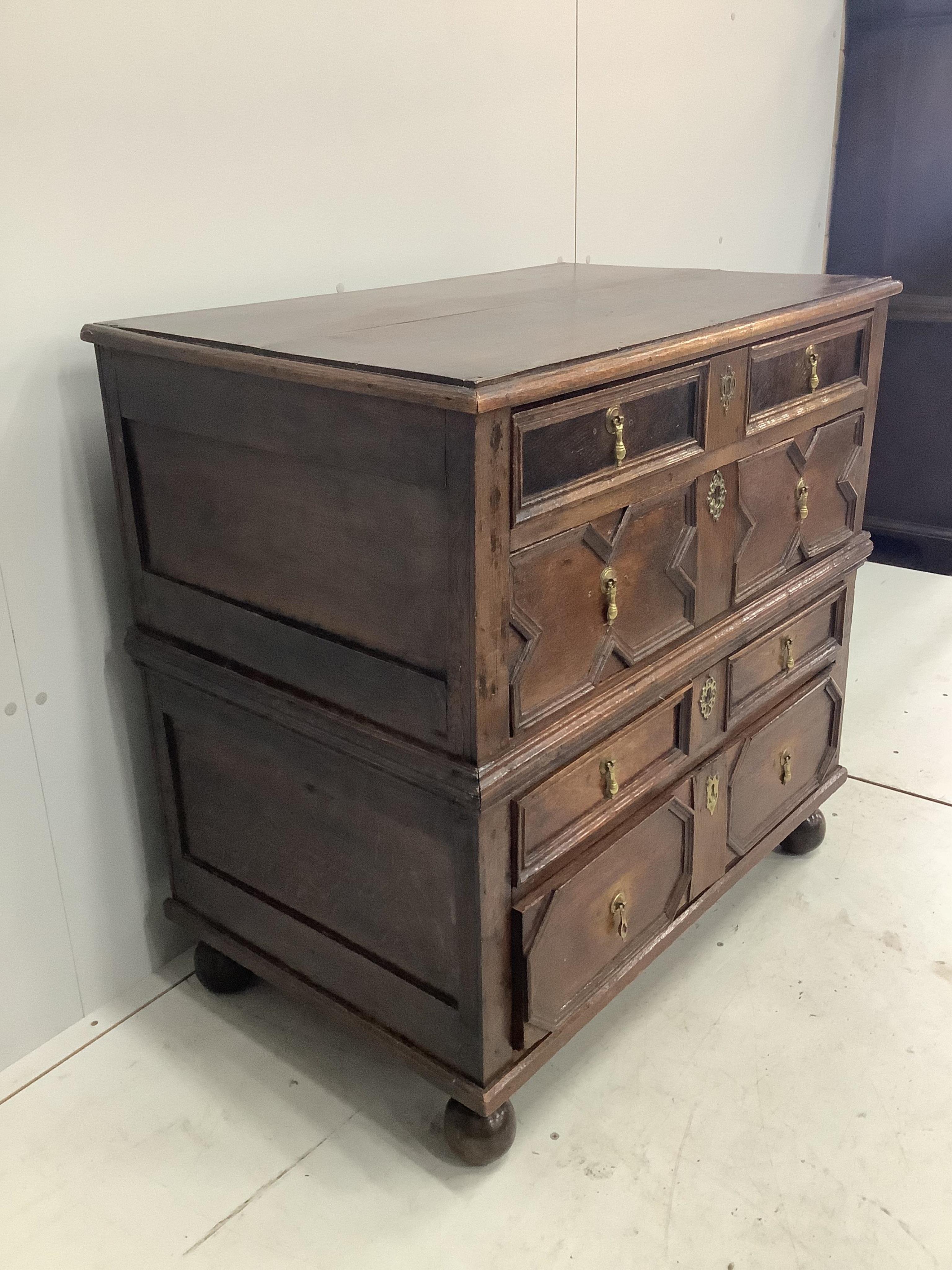 An early 18th century oak chest, width 92cm, depth 56cm, height 90cm. Condition - fair